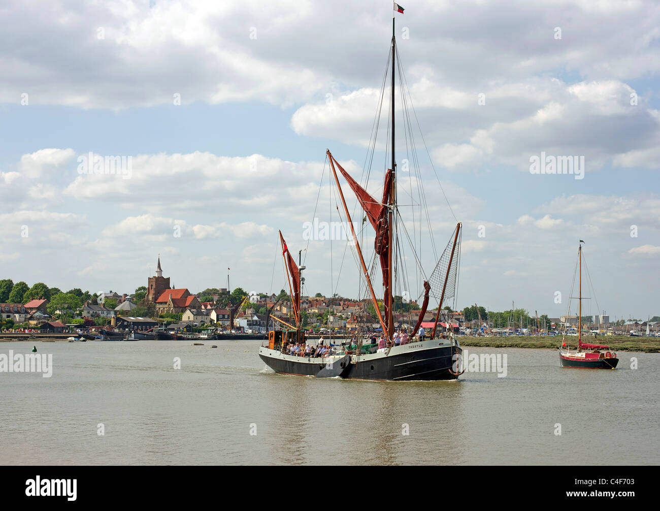 Boats on the Blackwater with the Essex town of Malden behind Stock Photo