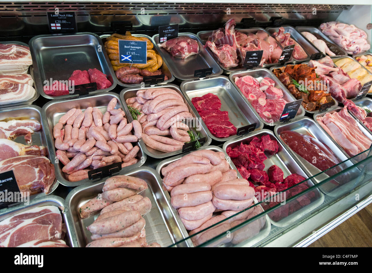 Quality meat and sausages in traditional butchers shop, London, UK