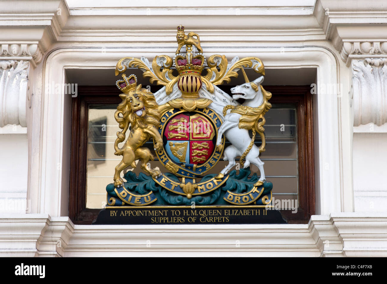 By Appointment to HM Queen Elizabeth II royal coat of arms outside shop