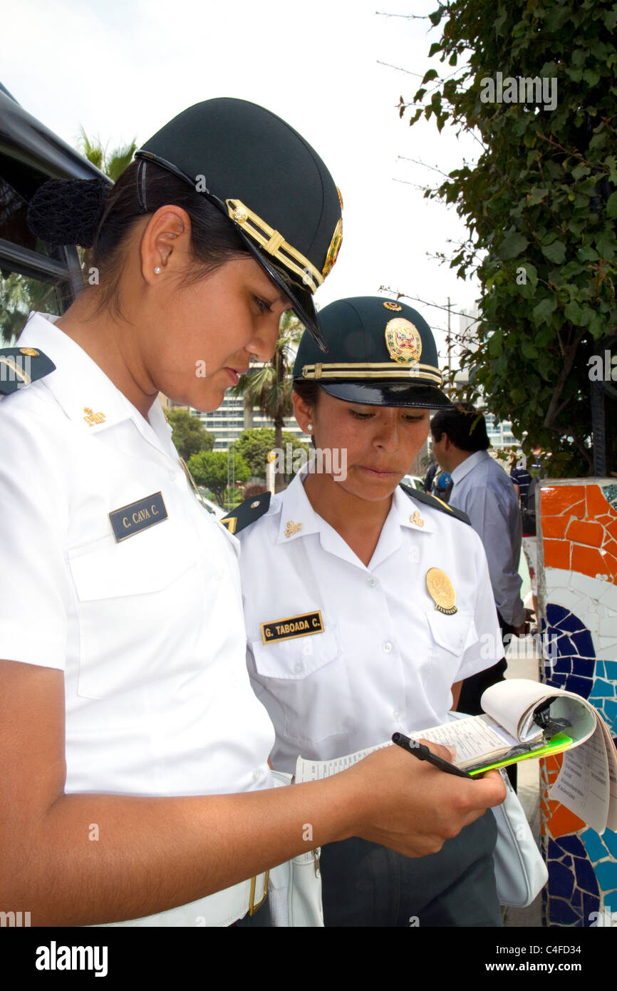 Female peruvian police officers in Lima, Peru. Stock Photo