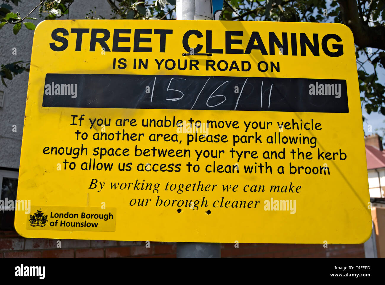 street cleaning in your road notice with date, in the london borough of
