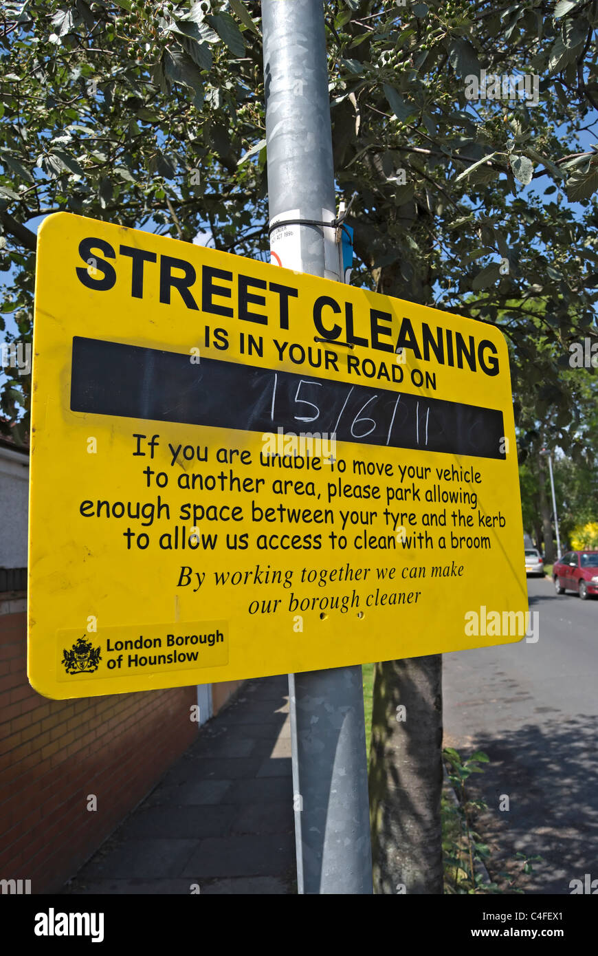 street cleaning in your road notice with date, in the london borough of