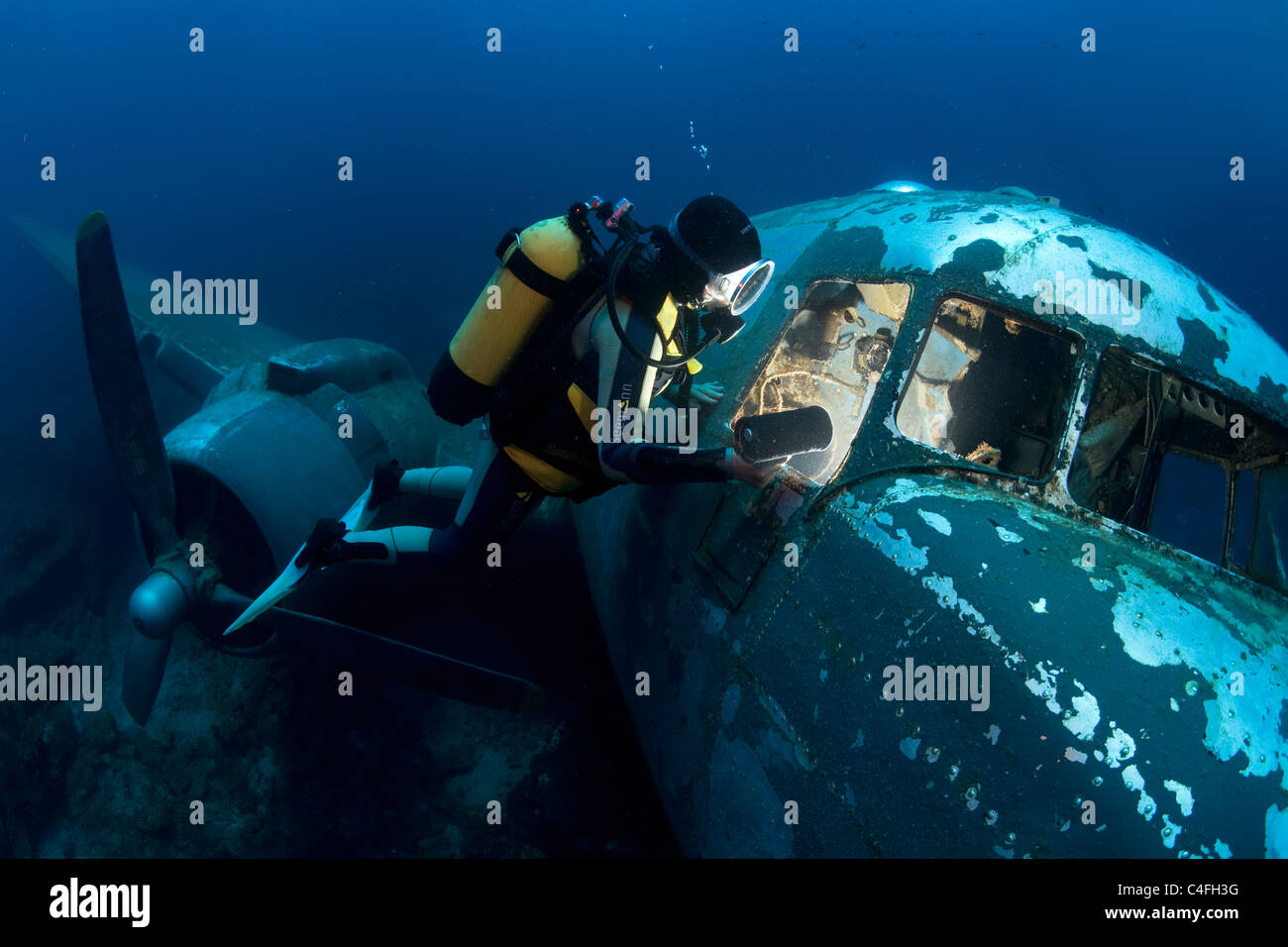 Scuba diver at a sunken airplane Douglas C 47 Dakota, Bodrum, Turkey Stock Photo