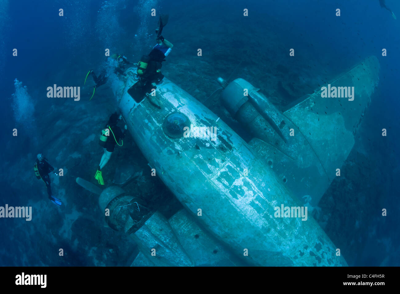 Scuba divers at a sunken airplane Douglas C 47 Dakota, Bodrum, Turkey Stock Photo