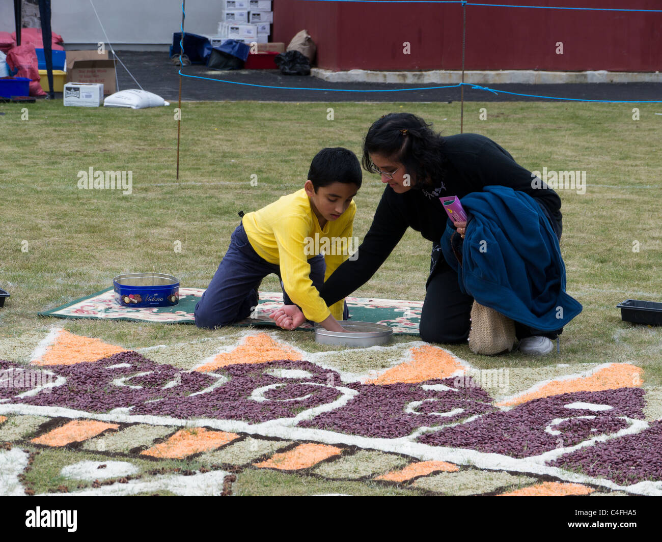 Local schoolboy Sandipan Sahu, aged seven, helps build the giant ...