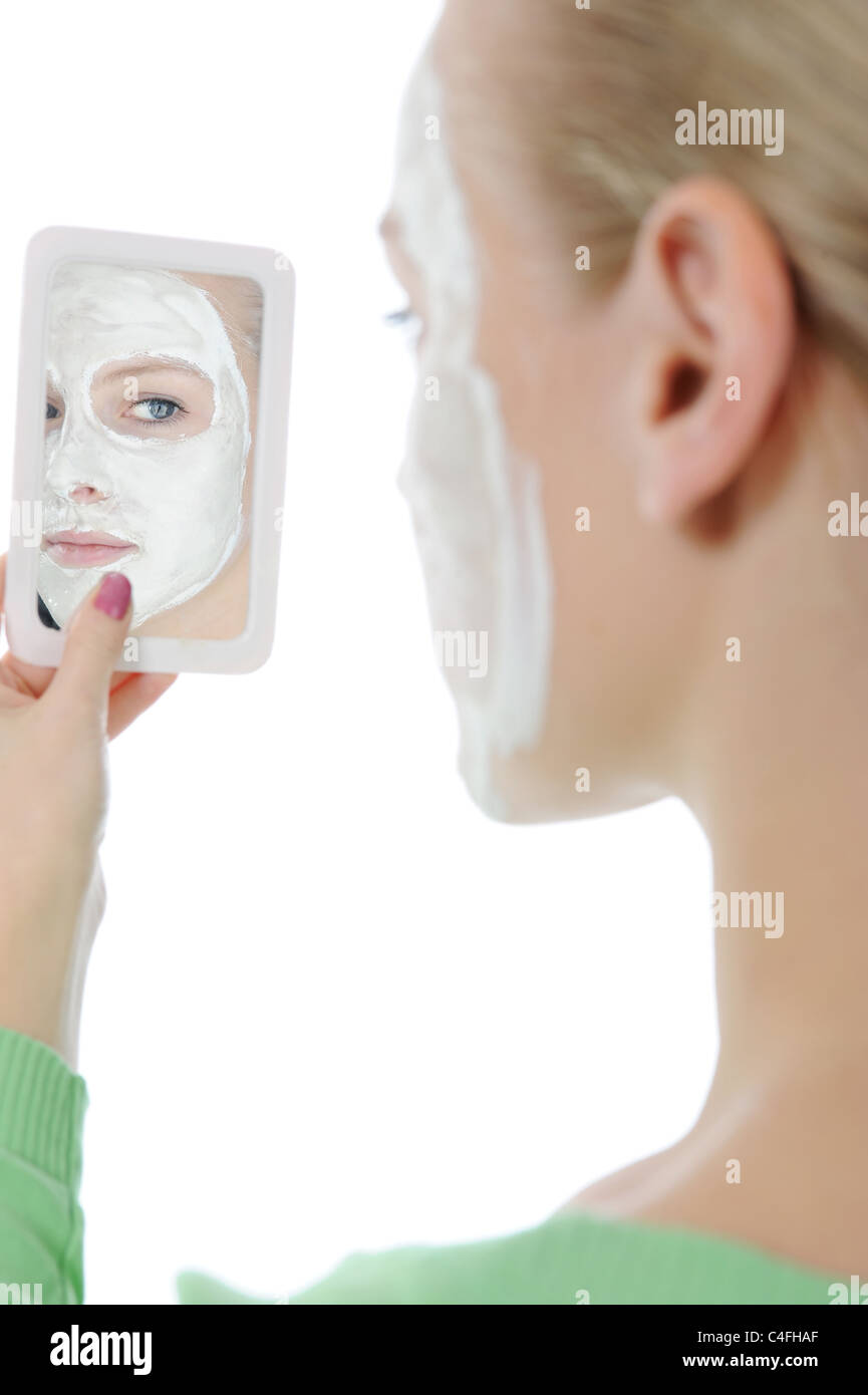 young woman making a mask Stock Photo