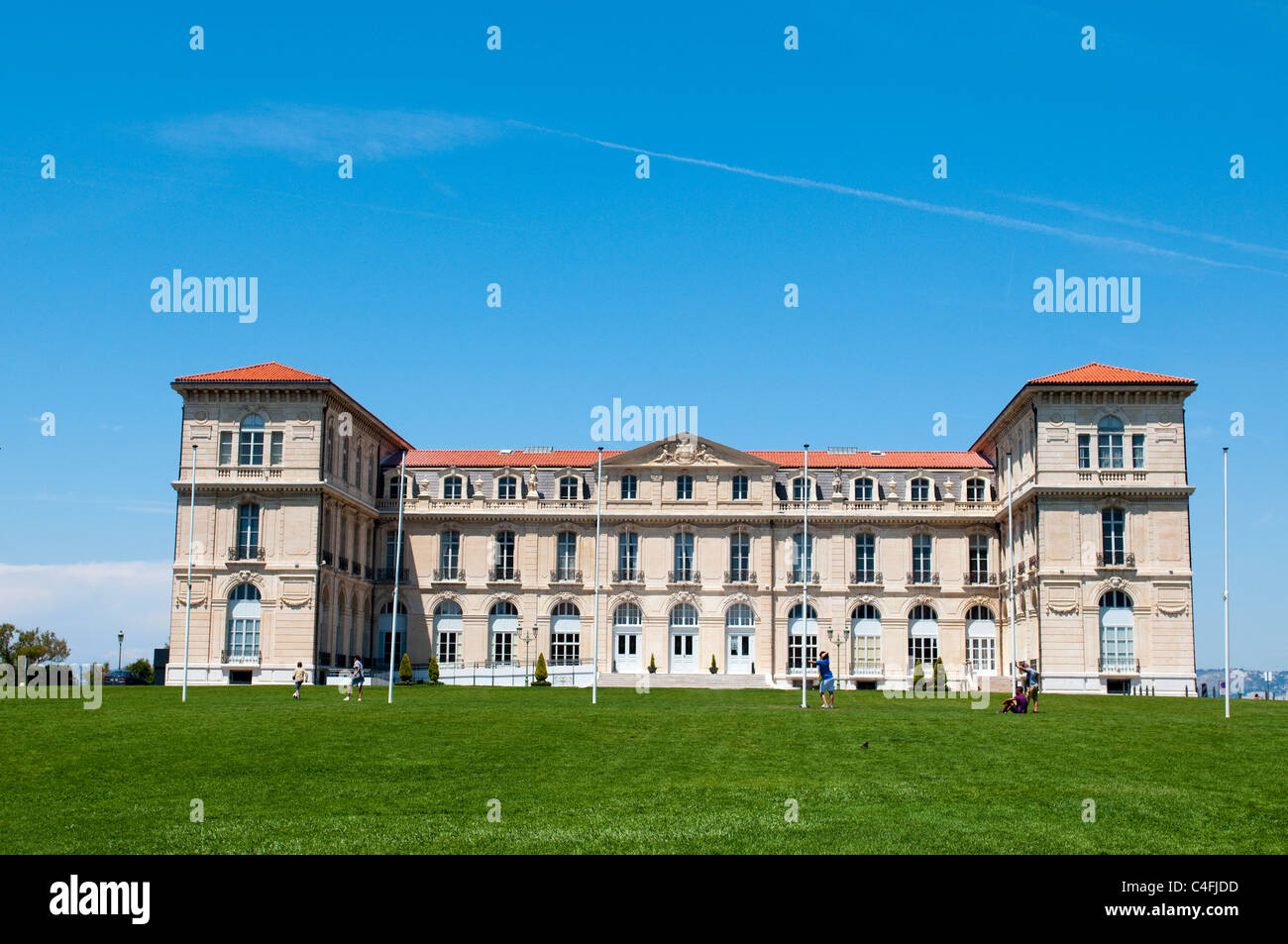 Peoples play football in front of palace Pharo. Marseille, France Stock Photo
