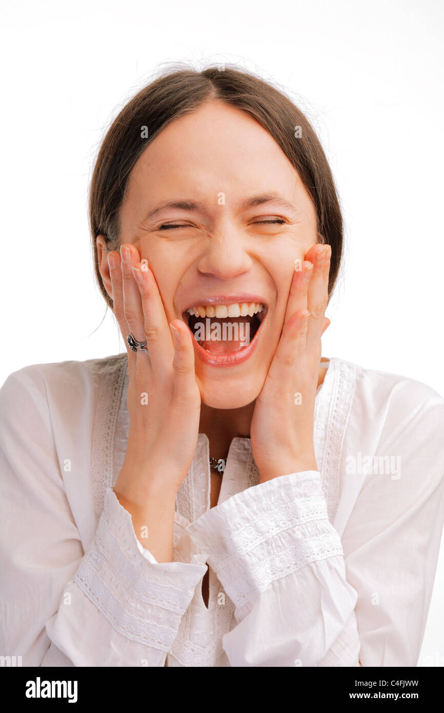 Closeup portrait of a happy surprised young woman on white background ...