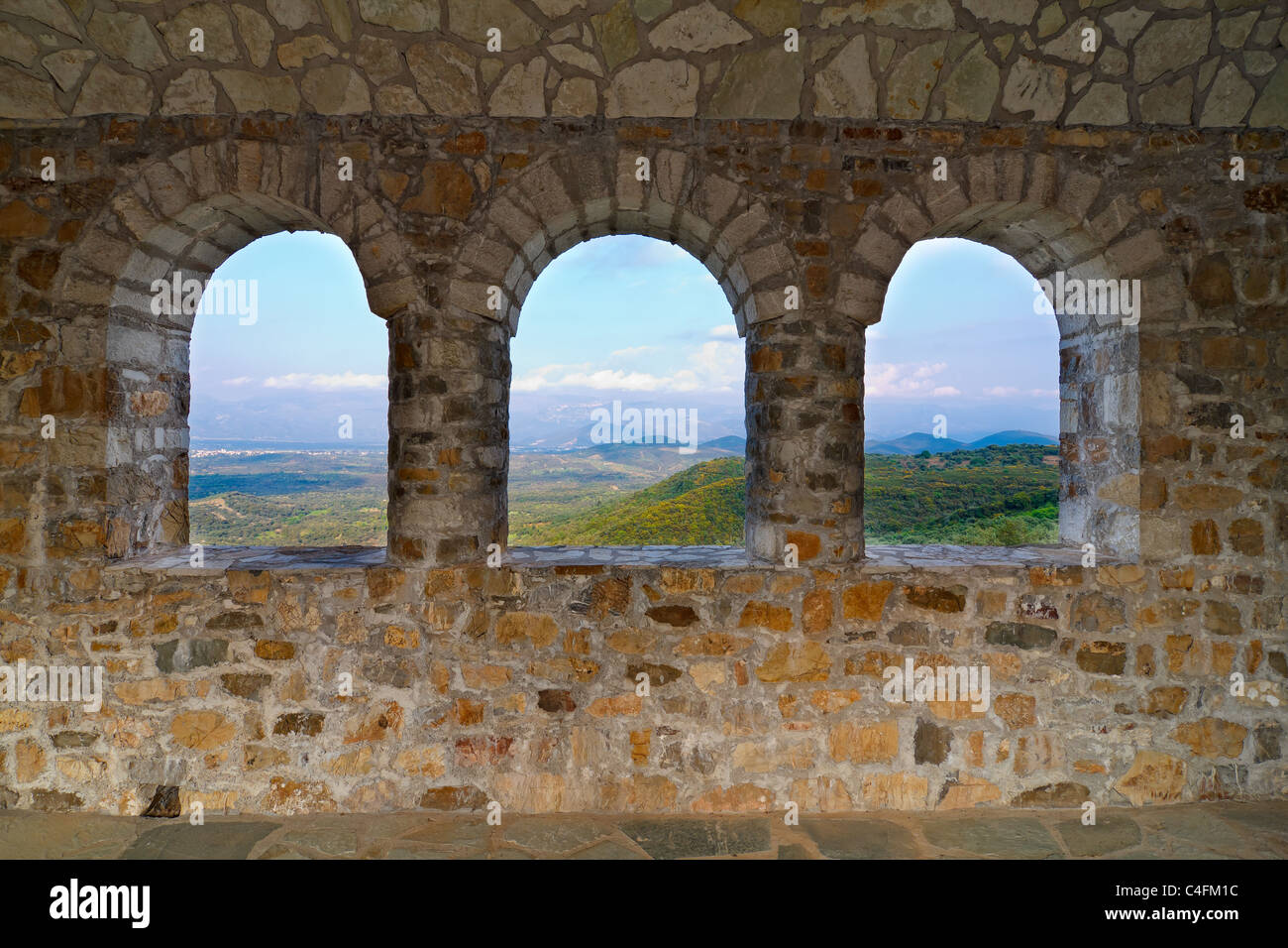 View through the windows of a Greek monastery towards the natural surroundings Stock Photo