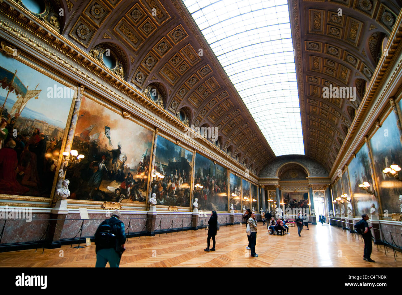 Crowds of tourists visit the Palace of Versailles and Gallery of