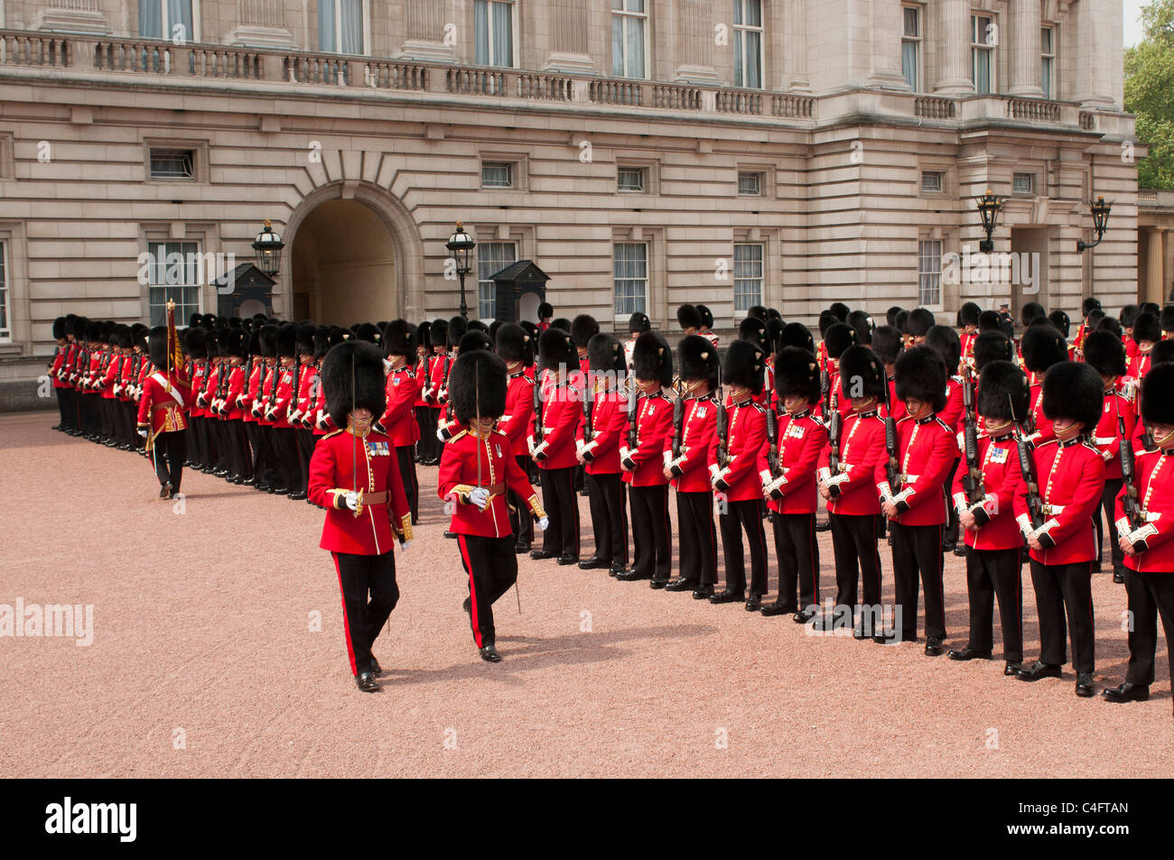 The Irish Guards regiment on ceremonial duty at Buckingham Palace in London. Stock Photo