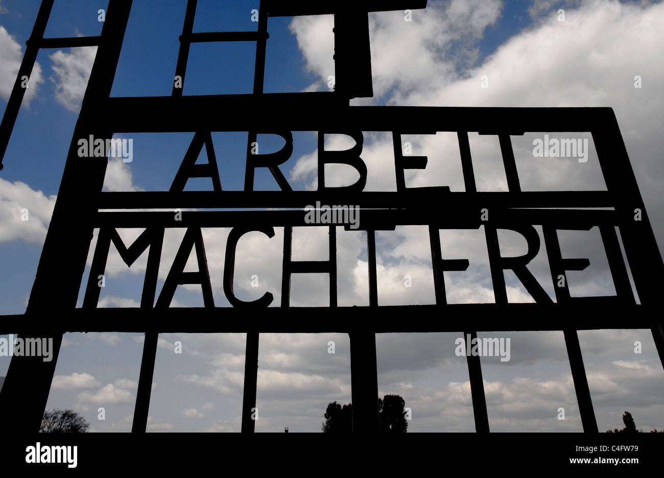 The gates of Sachsenhausen concentration camp with the inscription 'Arbeit macht frei' Stock Photo