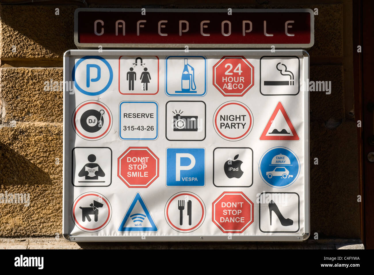 Russia , St Petersburg , Gostinyy Dvor , Cafe People innovative road signs outside fashionable cafe restaurant Stock Photo