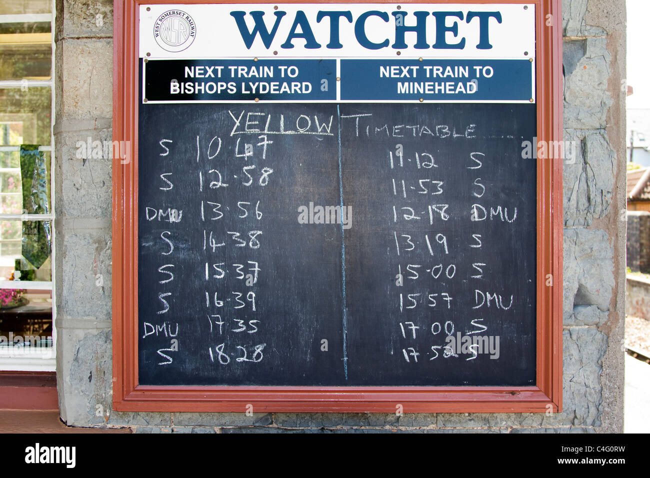 Blackboard of Chalked train times, Watchet Train Timetable, North Devon, England, UK Stock Photo