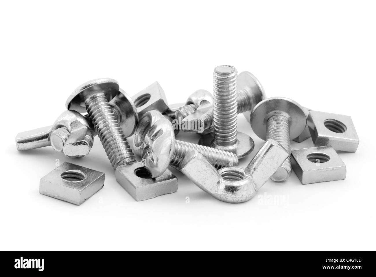 Pile of nuts and bolts isolated on a white background Stock Photo