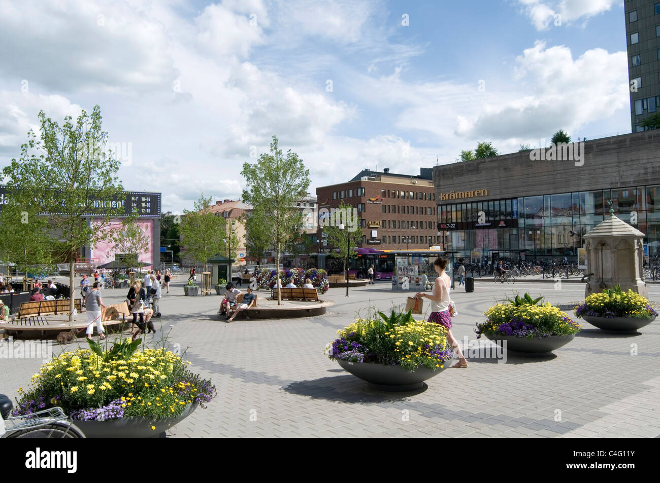 orebro sweden town square city cities swedish center centers shopping people walking in summer Stock Photo