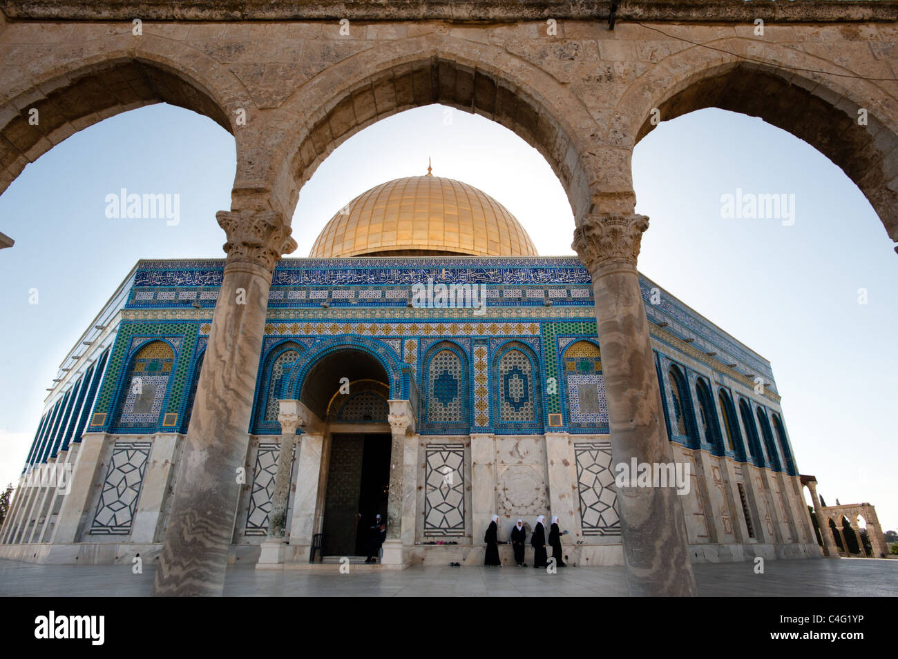 Haram Rocks Muslim girls walk near the entrance of Dome of the Rock on the Haram al ...