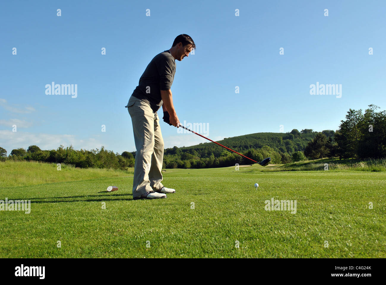 taking a golf shot Stock Photo