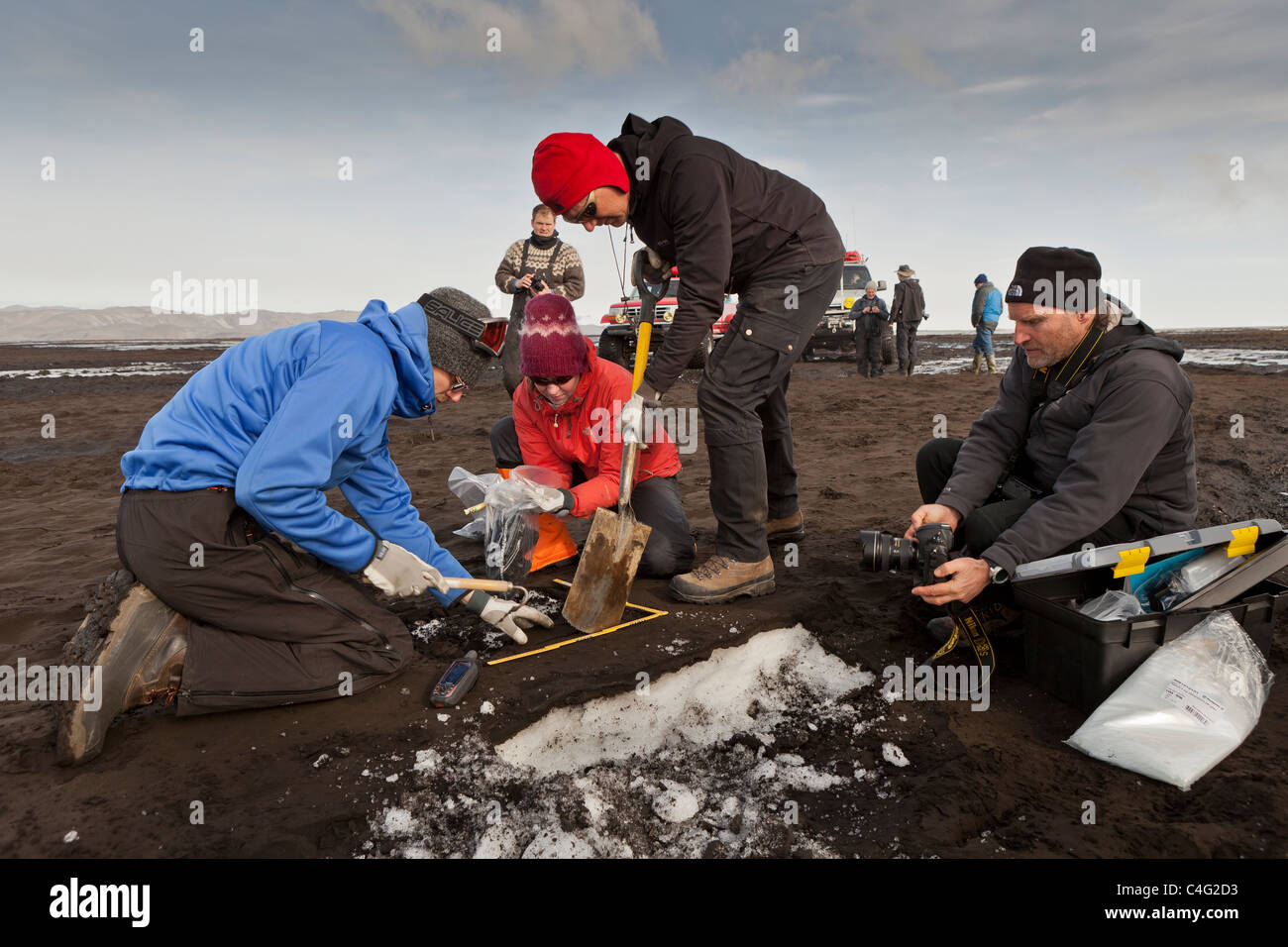 Scientist taking samples and measuring the ash fall from Grimsvotn volcanic eruption, Iceland Stock Photo