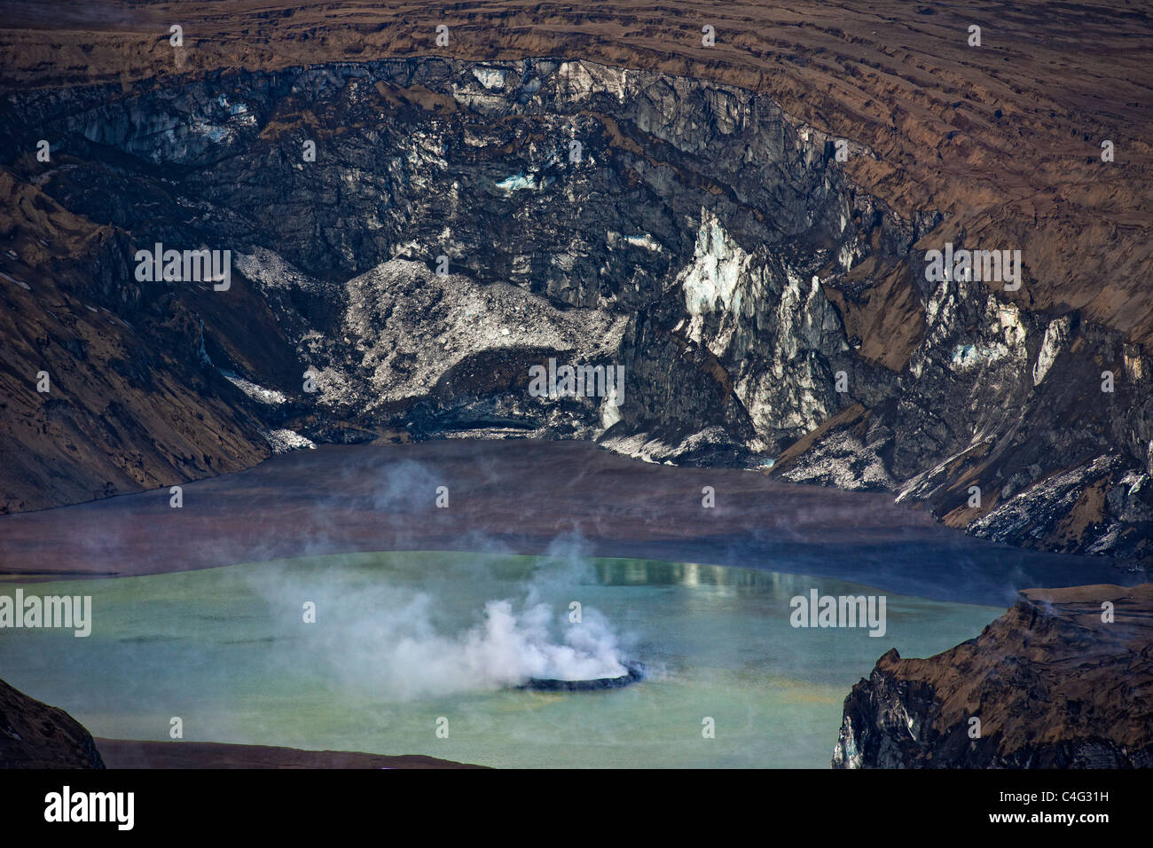 Grimsvotn crater steaming in lake, Grimsvotn volcanic eruption, Iceland Stock Photo