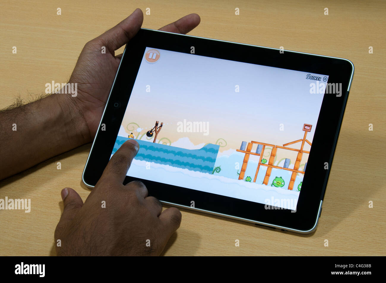 Angry bird game on iPad Stock Photo - Alamy