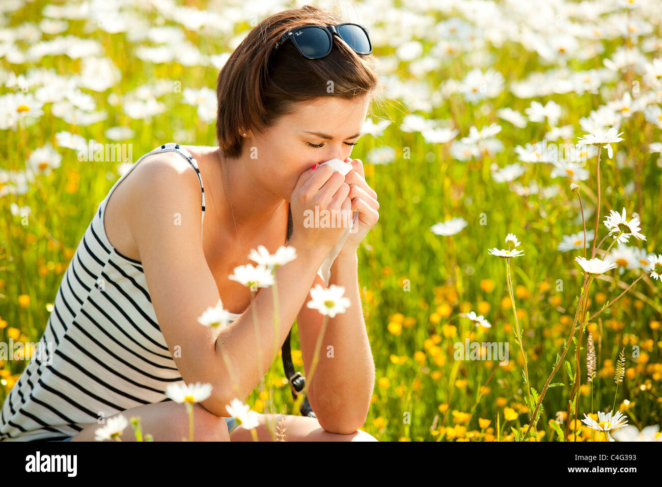 Girl with hayfever Stock Photo