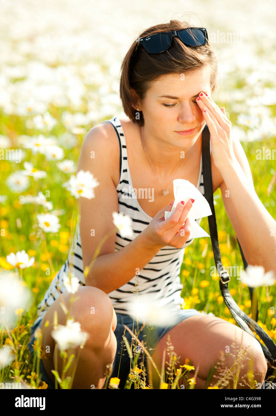Girl with hayfever Stock Photo