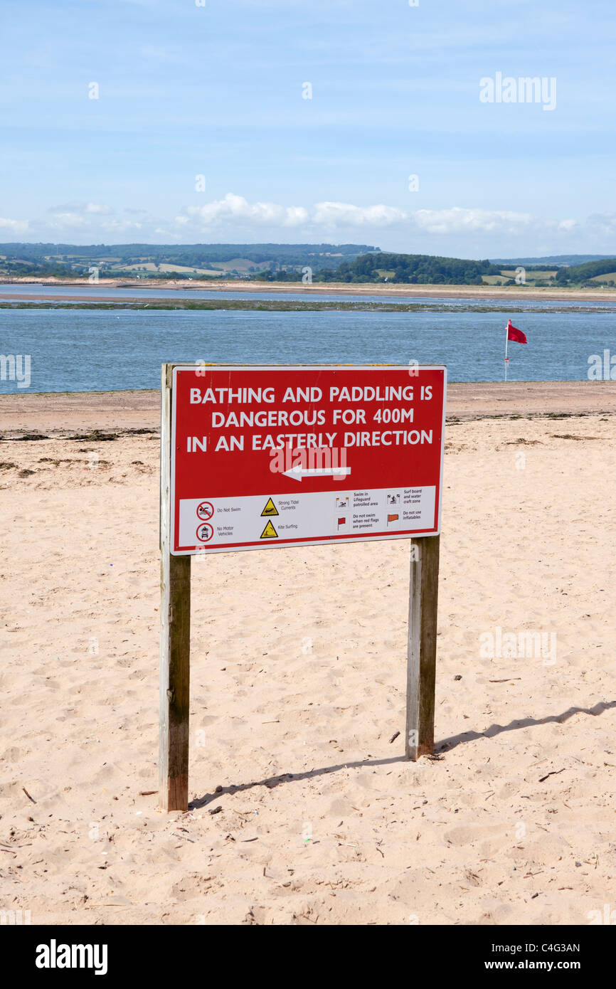swimming warning notices flag on beach near exmouth devon uk Stock Photo