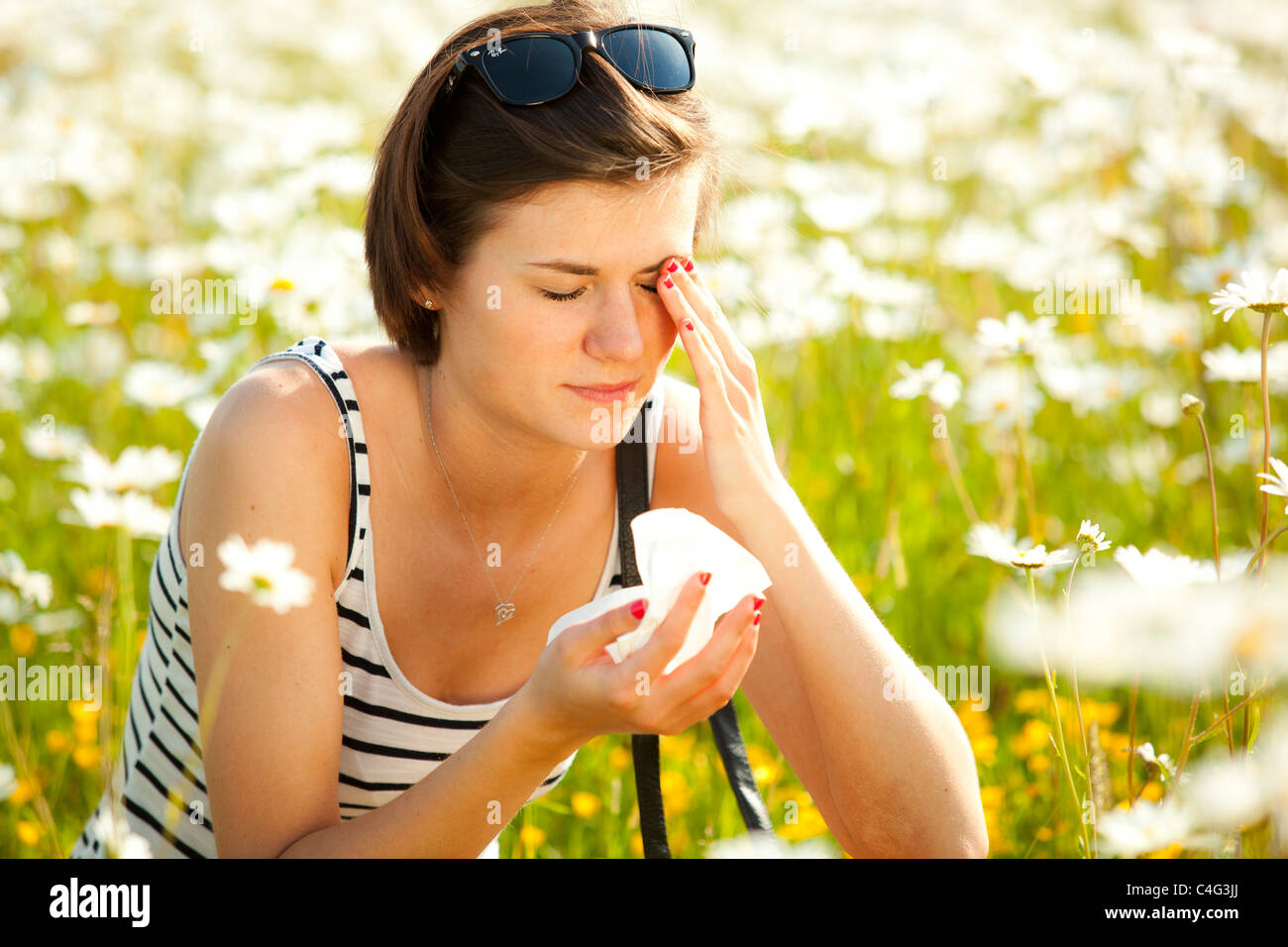 Girl with hayfever Stock Photo