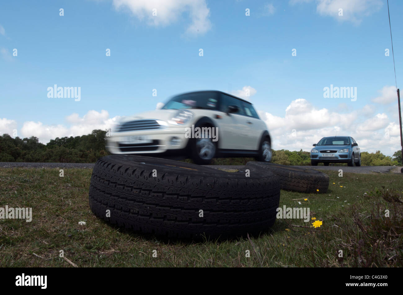Tyres dumped on roadside New Forest Stock Photo
