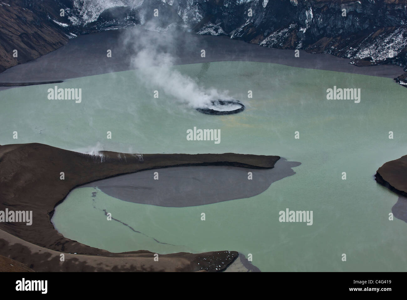 Grimsvotn crater steaming in lake, Grimsvotn volcanic eruption, Iceland Stock Photo
