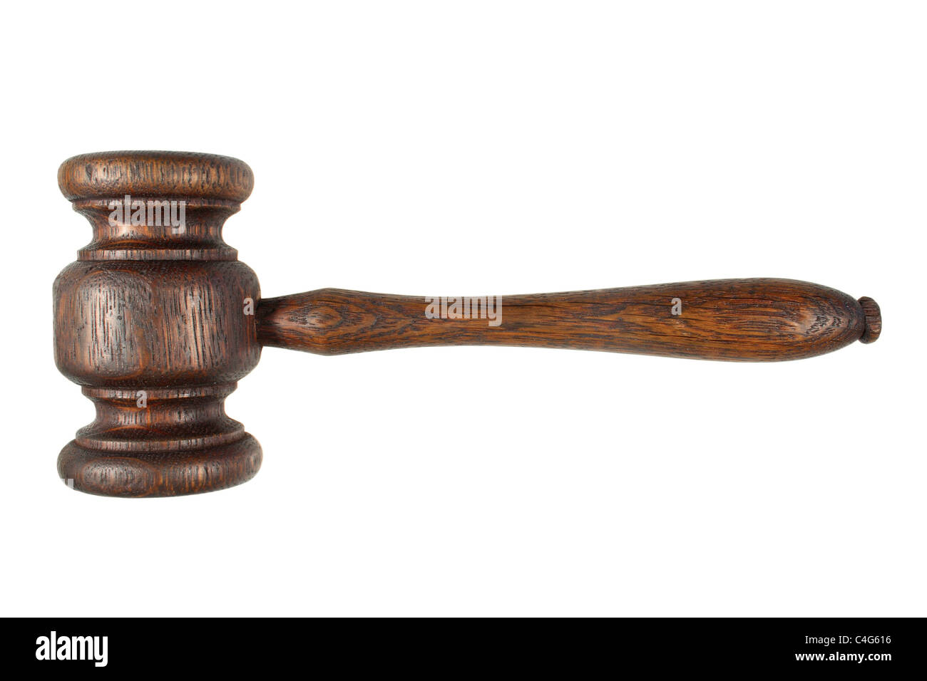 An old auctioneers/judges wooden gavel hammer, isolated on a white