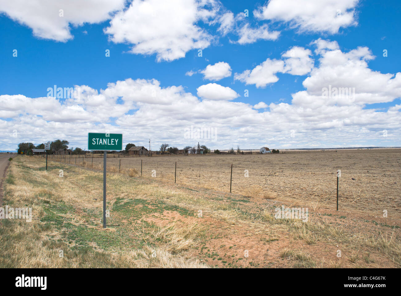 A sign along the roadside is the only indication that one is passing through the remote town of Stanley, New Mexico. Stock Photo