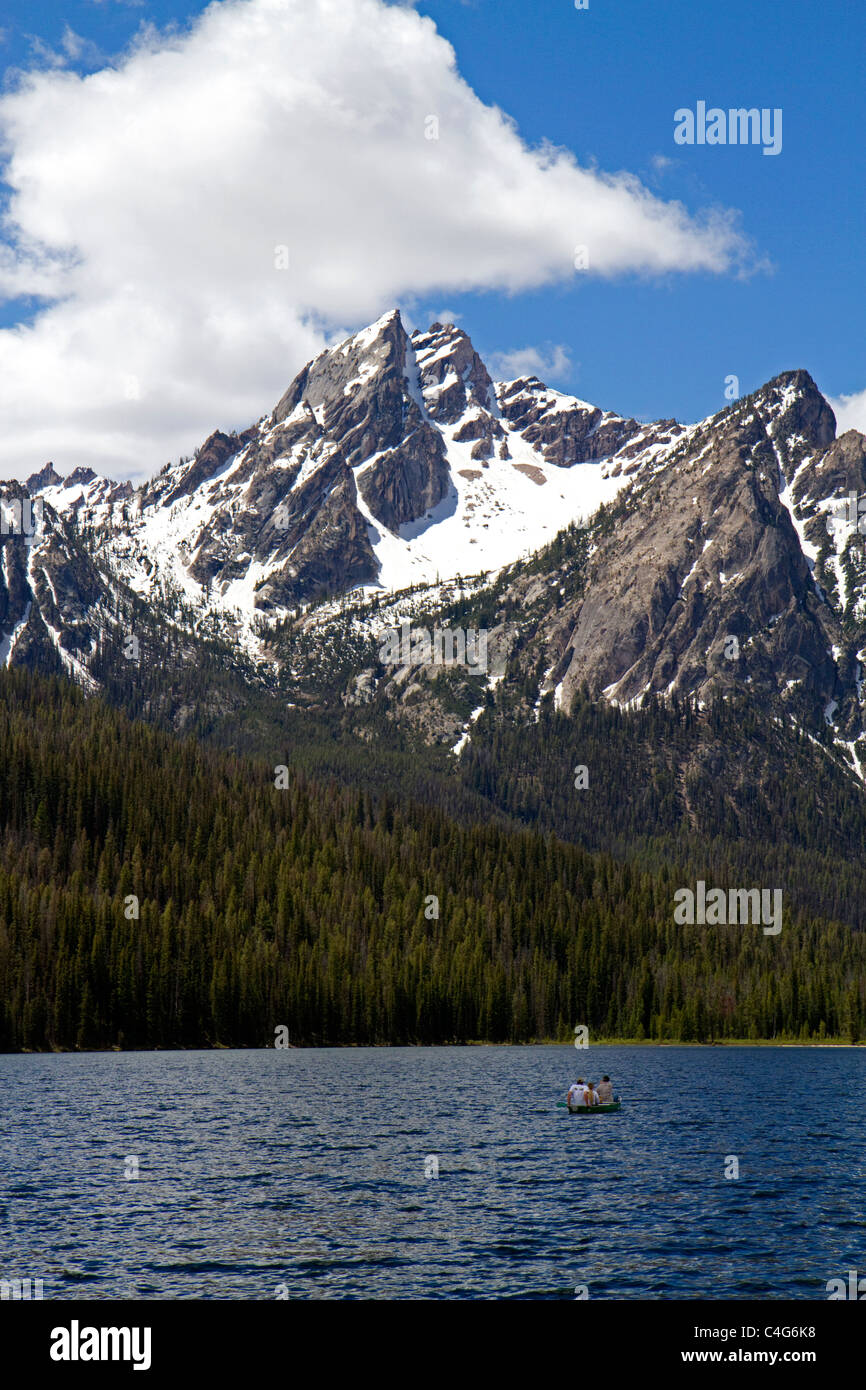 Canoeing on Stanley Lake in the Sawtooth Mountain Range near Stanley, Idaho, USA. Stock Photo