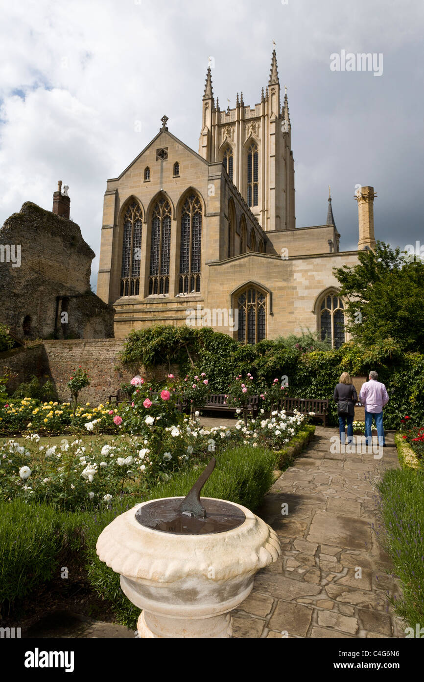 St Edmundsbury Cathedral from the the Abbey garden. People view the 94th Bombardment Group memorial, Suffolk, UK Stock Photo