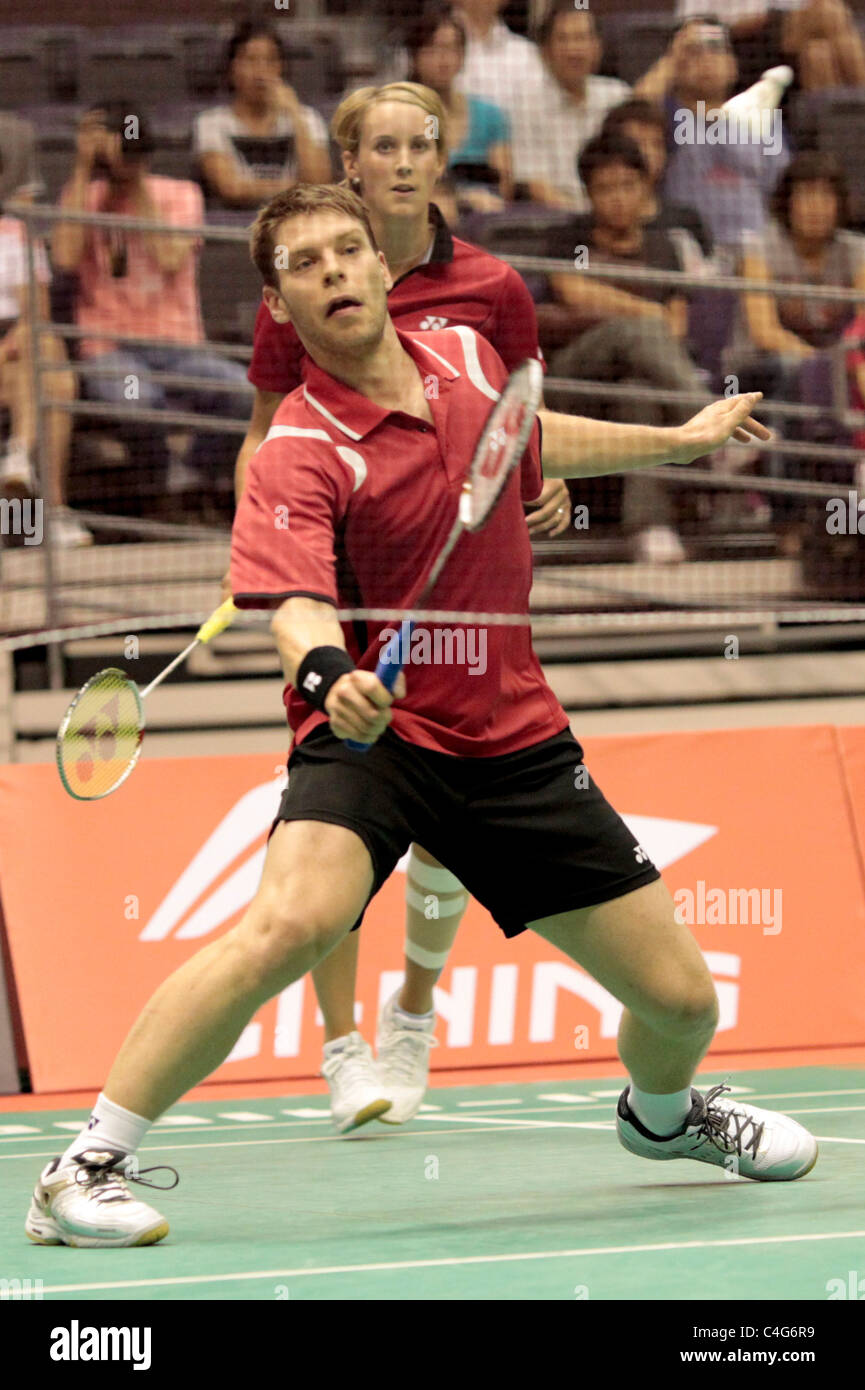Birgit Michels and Michael Fuchs of Germany during the Mixed Doubles Round 1 of the Li-Ning Singapore Open 2011. Stock Photo