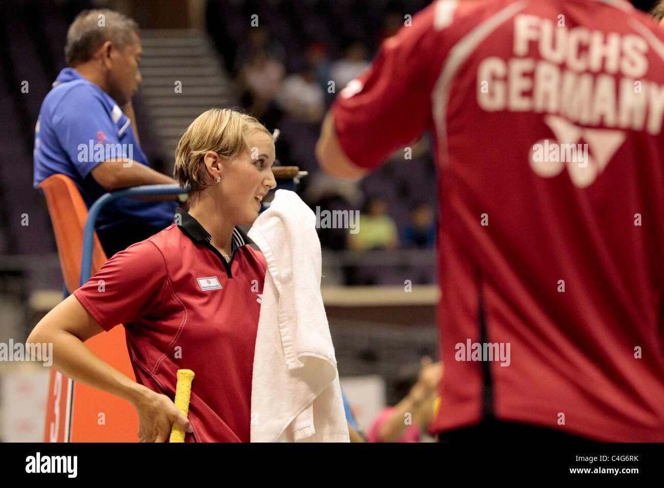 Birgit Michels(left) of Germany during the Mixed Doubles Round 1 of the Li-Ning Singapore Open 2011, Stock Photo