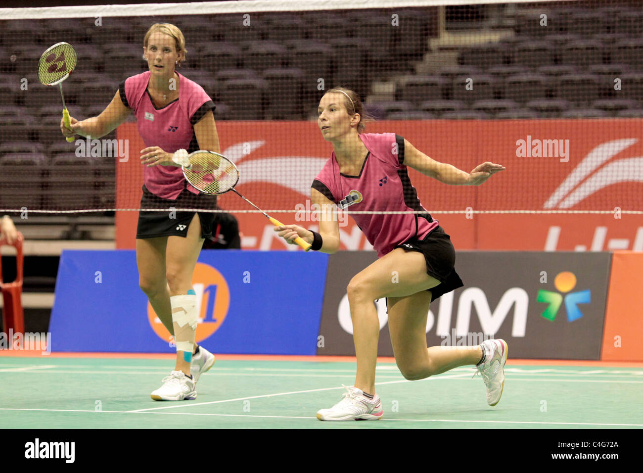 Birgit Michels and Sandra Marinello of Germany during the Women's Doubles Round 1 of the Li-Ning Singapore Open 2011. Stock Photo