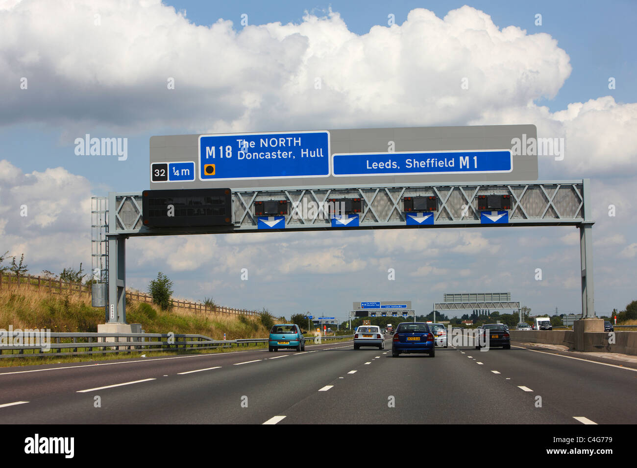 Motorway sign junction 32 on M62 Stock Photo