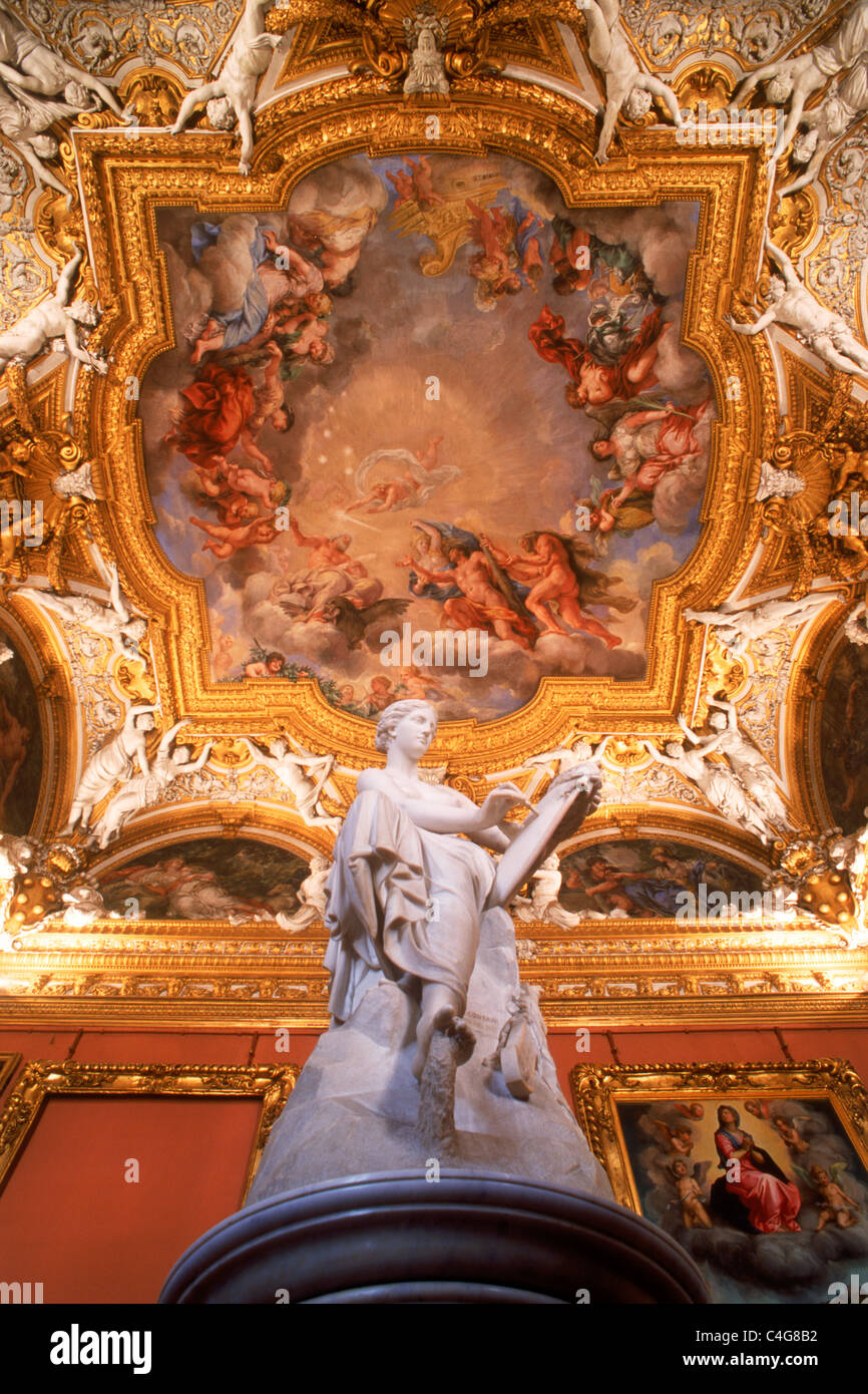 Ceiling fresco and statue of Galleria Palatina in Palazzo Pitti in Florence Stock Photo