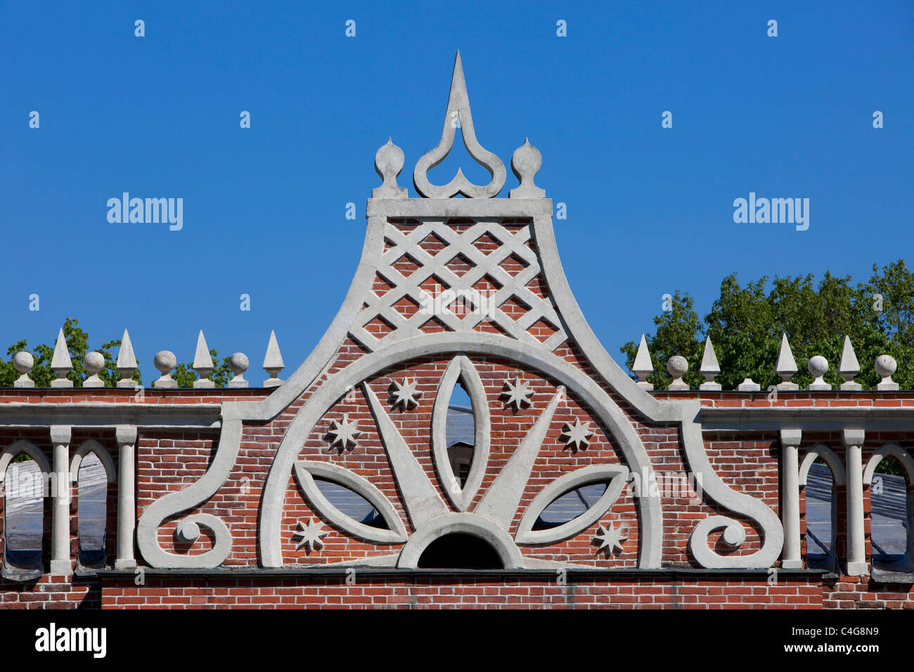 Neo-Gothic (Gothic Revival) decorations on the facade of the Second Cavalry Housing at the 18th century Tsaritsyno Estate in Moscow, Russia Stock Photo