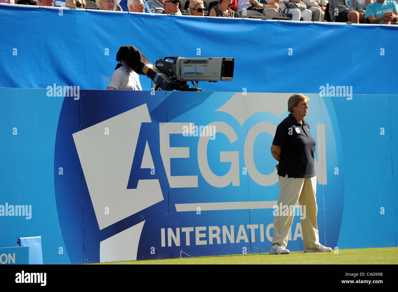 An outside broadcast television cameraman working at the Aegon International tennis in Eastbourne UK Stock Photo