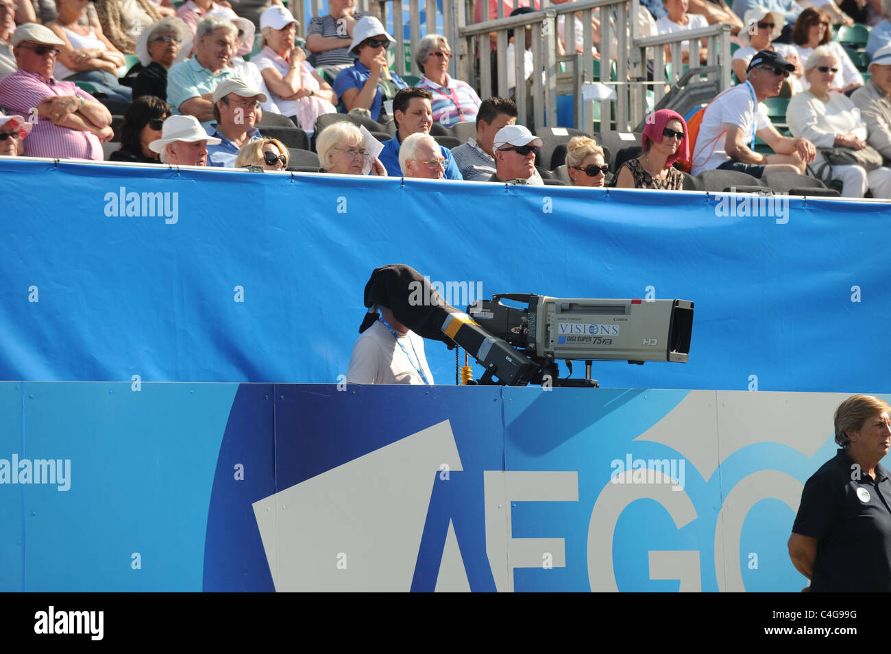 An outside broadcast television cameraman working at the Aegon International tennis in Eastbourne UK Stock Photo