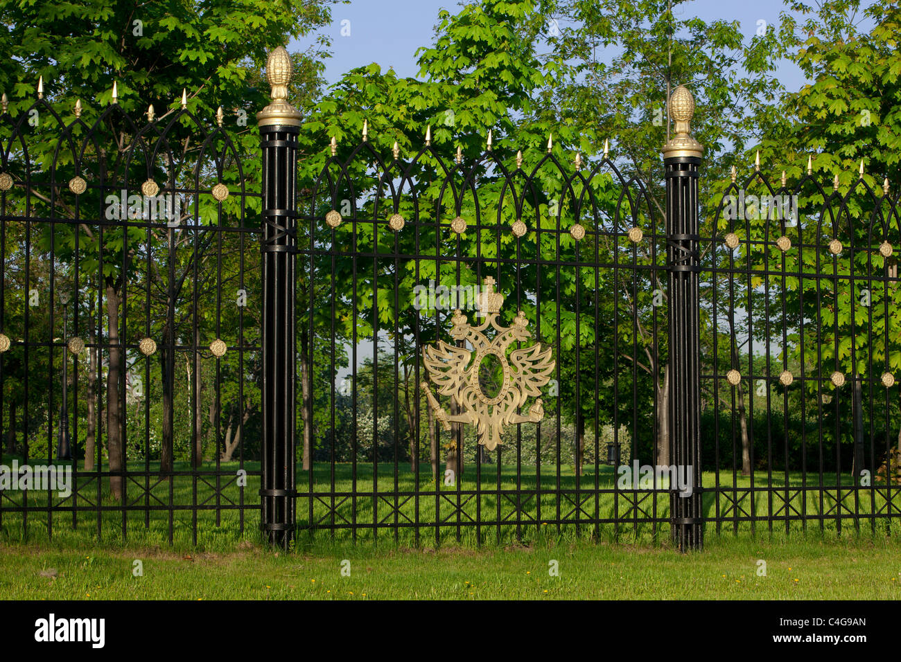 The coat of arms of Russia on the fence of the 18th century Neo-Gothic (Gothic Revival) Tsaritsyno Palace in Moscow, Russia Stock Photo