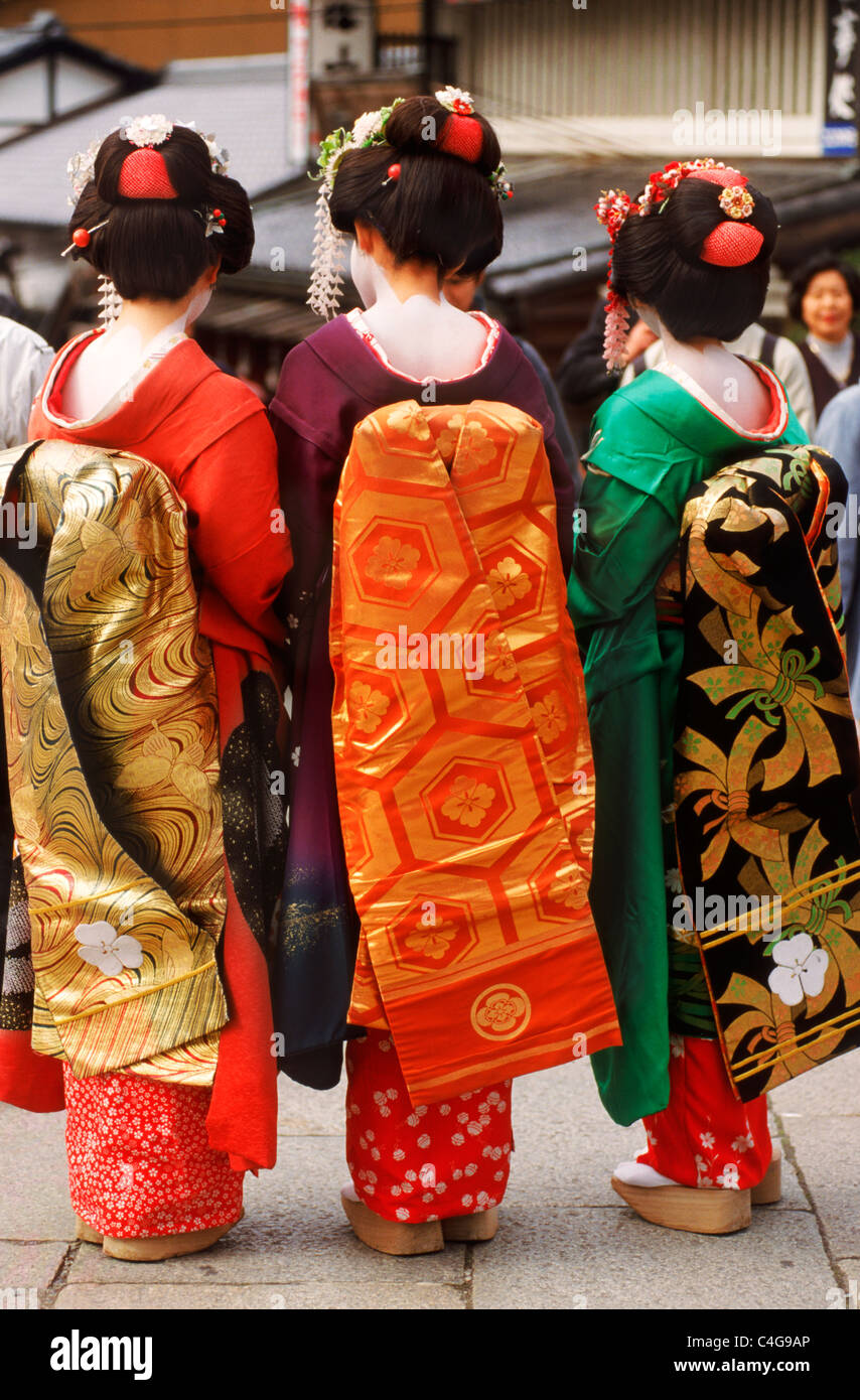 Three Japanese women wearing colorful kimonos during festival Stock Photo