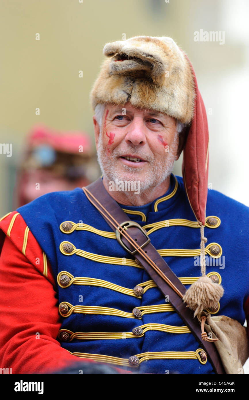 performer of the annual medieval parade Meistertrunk, dressed in historical costume as soldier on horse in Rothenburg, Germany Stock Photo