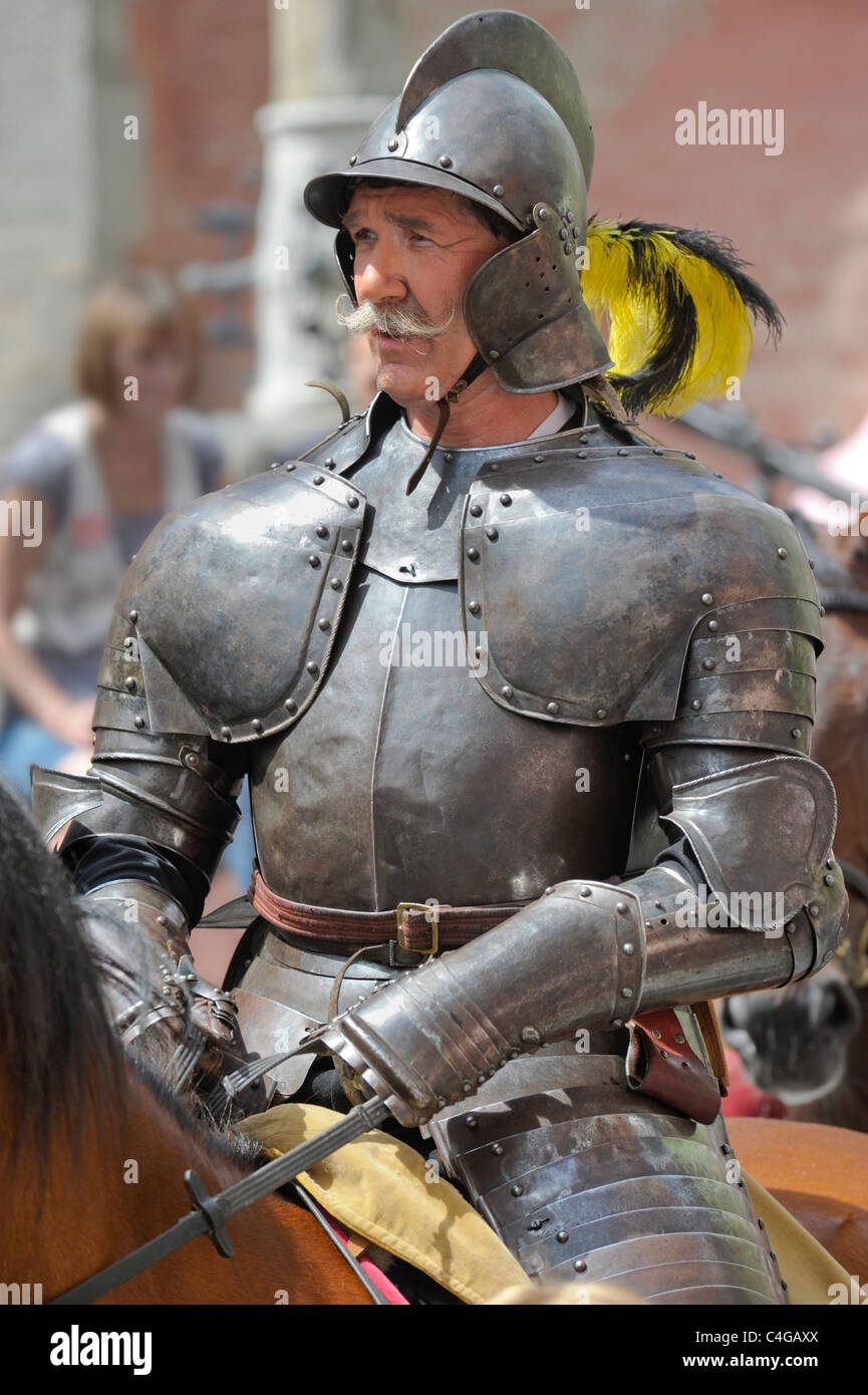 performer of the annual medieval parade Meistertrunk, dressed in historical costume as knight on horse in Rothenburg, Germany Stock Photo