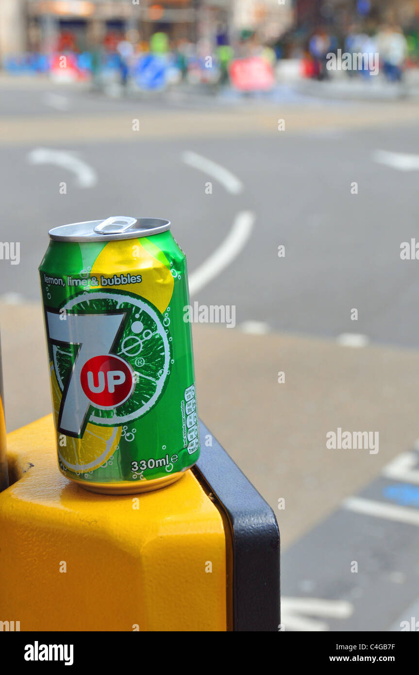 7 Up drinks can litter pedestrian crossing road blurred Stock Photo