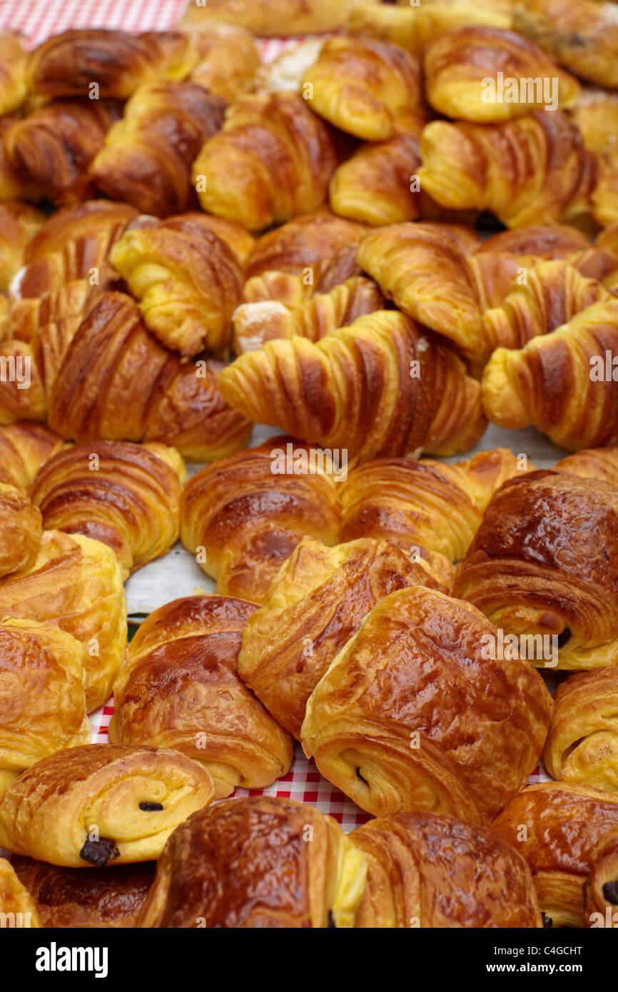 croissants and pain au chocolate in the market at Revel, Haute-Garonne, Midi-Pyrenees, France Stock Photo