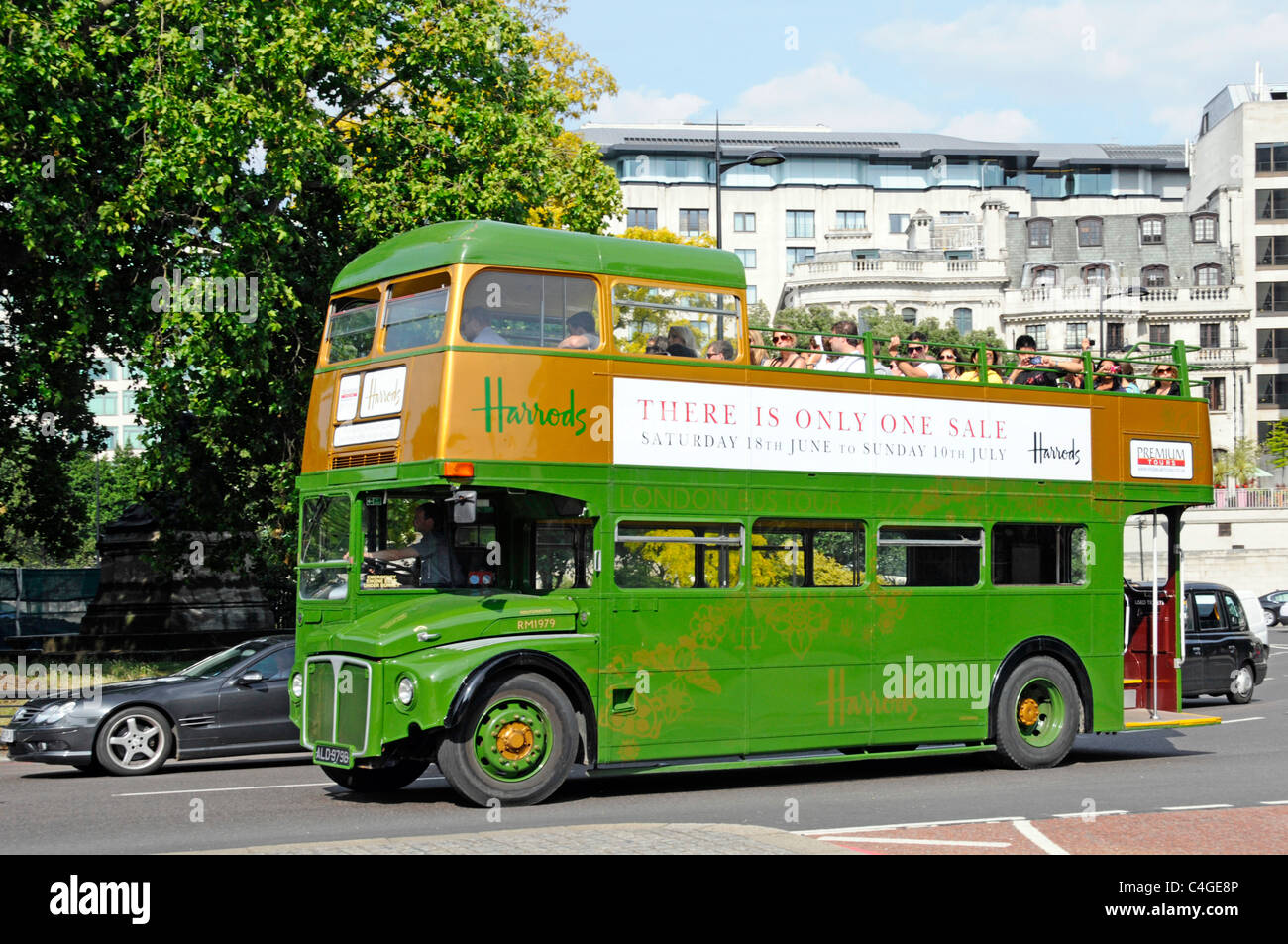 Premium Tours open top Routemaster tour bus in Harrods store livery and Sale  advert Stock Photo - Alamy